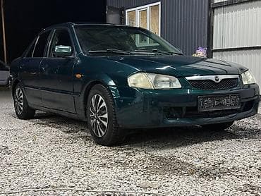 е34 люк: Mazda 323: 2000 г., 1.3 л, Механика, Бензин, Седан — 7