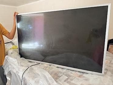 иксбокс оне с: Телевизор Skyworth, диагональ около 46–50". Узкие серебристые рамки — 1