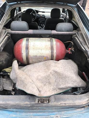 Mazda 626: 1993 г., 2 л, Механика, Газ, Хэтчбэк