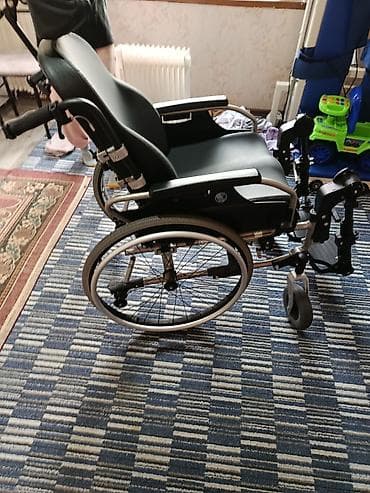 кыргызская национальная одежда: Инвалидная коляска — 2