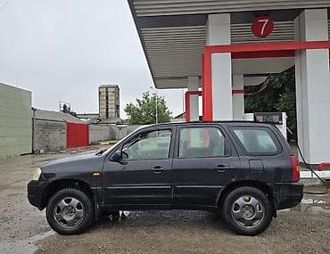 обмен транспорта: Mazda Tribute: 2001 г., 2 л, Механика, Газ, Внедорожник — 3