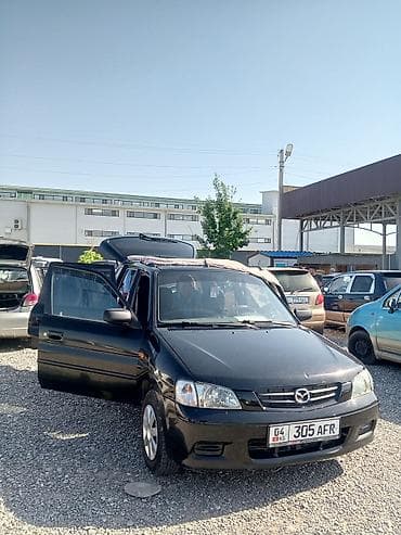 Транспорт: Mazda Demio: 2000 г., Механика, Хэтчбэк — 1