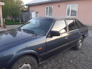 мини борт: Mazda 626: 1986 г., 1.6 л, Ручные, Бензин, Хэтчбэк — 5