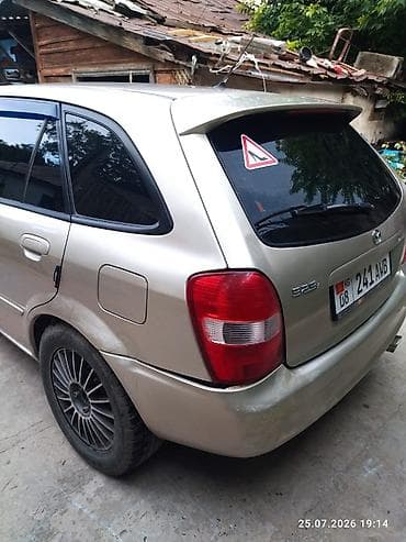 pump wedge: Mazda Familia: 2026 г., Универсал — 6