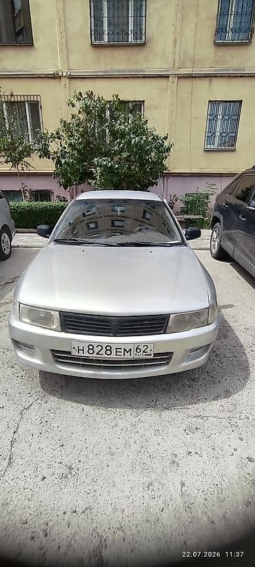 Mitsubishi Lancer: 1997 г., 1.3 л, Механика, Бензин, Седан