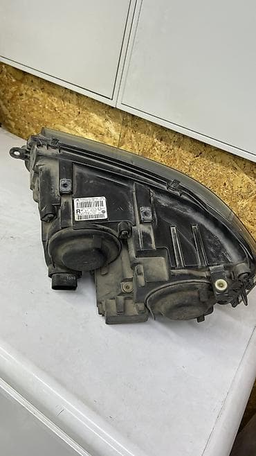 Стоп-сигналы: Передняя левая фара Volkswagen 2011 г., Б/у, Оригинал, Германия — 2