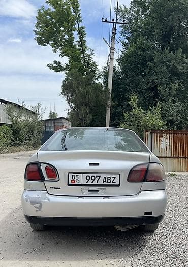 daewo magnus: Nissan Primera: 2000 г., 1.8 л, Механика, Бензин, Седан — 2