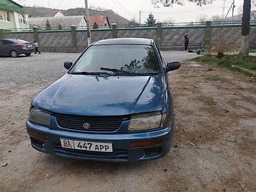 мазда диска: Mazda 323: 1992 г., Седан — 1