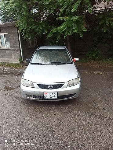 Mazda Familia: 2002 г., 1.6 л, Механика, Бензин, Седан