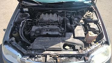 Mazda Familia: 2003 г., 1.6 л, Механика, Бензин, Универсал — 7