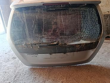 step: Кузовные запчасти на Subaru Forester (на фото): - Капот серебристый — 4