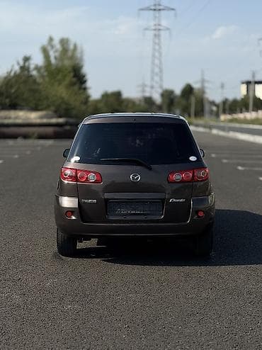 bcd com: Mazda Demio: 2006 г., 1.3 л, Автомат, Бензин, Хэтчбэк — 4