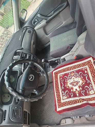 maz: Mazda 323: 2003 г., 1.6 л, Ручные, Бензин, Седан — 5