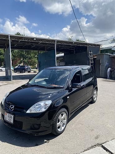 күзгү: Mazda Demio: 2004 г., 1.5 л, Автомат, Бензин, Хетчбек — 1