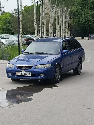 сткл: Mazda Capella: 2000 г., 1.8 л, Механика, Бензин, Универсал — 2