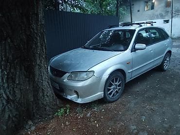 Mazda 323: 2002 г., 2 л, Автомат, Бензин, Хетчбек lalafo.kg да Mazda 323: 2002 г., 2 л, Автомат, Бензин, Хетчбек