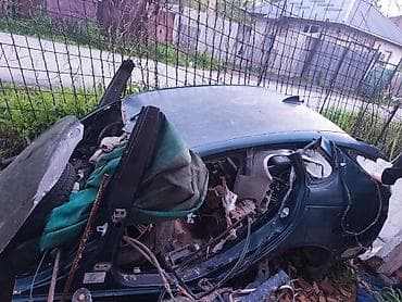 Разбор автомобиля на запчасти (хэтчбек, темно‑зеленый цвет кузова) В — 3