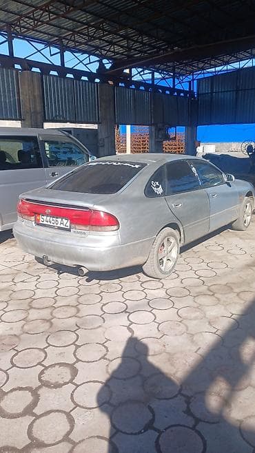 карбюратор на муравей: Mazda Cronos: 1993 г., 1.8 л, Механика, Бензин — 10