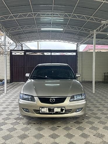 бампер mazda demio: Mazda 626: 2000 г., 2 л, Механика, Бензин, Седан — 2