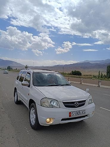 ролер: Mazda Tribute: 2002 г., 2 л, Автомат, Бензин, Кроссовер — 1