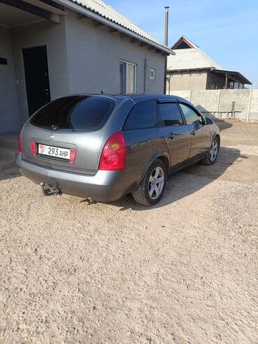 брендирование авто бишкек: Nissan Primera: 2002 г., 2 л, Вариатор, Универсал — 4