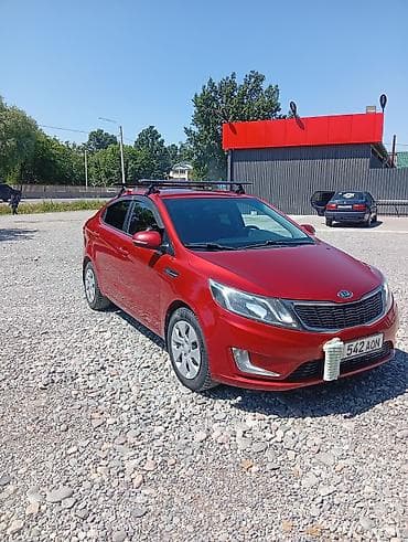 кызыл кия кыз: Kia Rio: 2012 г., 1.6 л, Кол менен иштөөчү, Бензин, Седан — 2