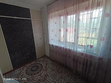 туз село: Большой дом по ул. Тельмана (Карасаева, 30). - Планировка: 4 комнаты — 5