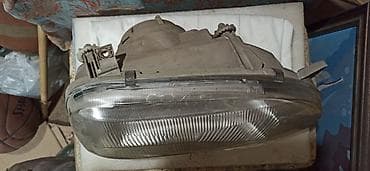 шестерёнки: Передняя левая фара Volkswagen — 2