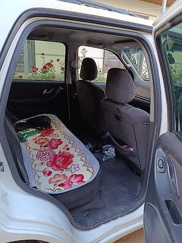 дизельный двигатель: Mazda Tribute: 2002 г., 2 л, Автомат, Бензин, Кроссовер — 10