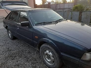 мини борт: Mazda 626: 1986 г., 1.6 л, Ручные, Бензин, Хэтчбэк — 8