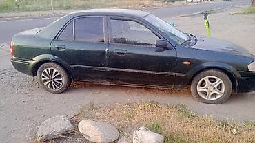 1998: Mazda 323: 1998 г., Седан — 3