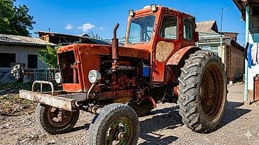 другой: Трактор колесный, класс тяги около 1,4–2,0. Кабина закрытая — 3