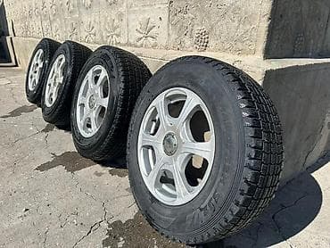 70: Комплект из 4 колес в сборе: литые диски + зимние шины Dunlop — 2
