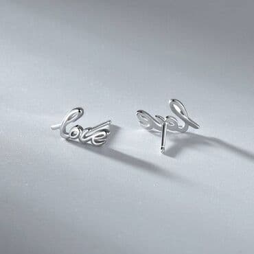 самые красивые свадебные платья в мире: Серебристые серьги - гвоздики НС в виде слова «love» — стильный и — 4