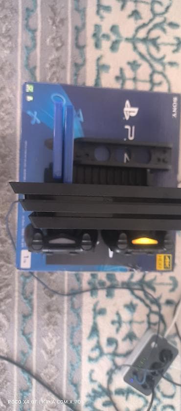 ps5 pro купить: Игровая приставка Sony PlayStation 4 Pro (1 ТБ) с комплектом — 9