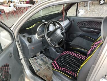 зимный шыны: Хэтчбек Daewoo Matiz серого цвета с четырьмя дверями и компактным — 5