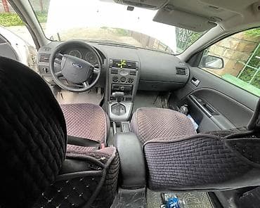 aion v plus 2022: Ford Mondeo: 2004 г., 2 л, Автомат, Газ, Универсал — 4