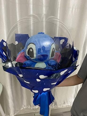 Букет-сюрприз с мягкой игрушкой в прозрачном шаре. - Композиция