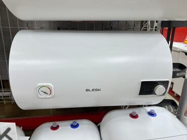 электрические казан: Водонагреватель Blesk в белом корпусе цилиндрической формы. Оснащен — 1