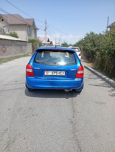 6: Mazda 323: 2001 г., 1.6 л, Механика, Бензин, Хэтчбэк — 4