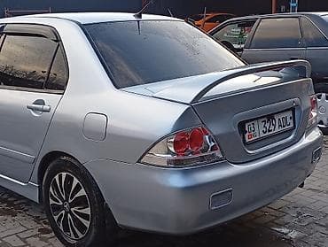 муссо санйон: Mitsubishi Lancer: 2006 г., 1.6 л, Автомат, Бензин, Седан — 3