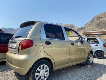 фары на опель вектра б: Хэтчбек Daewoo Matiz в цвете "золотой беж" с пятидверным кузовом — 2