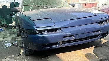 Башкалар: Редкий японский седан начала 1990‑х с выдвижными фарами, темно‑синего — 2