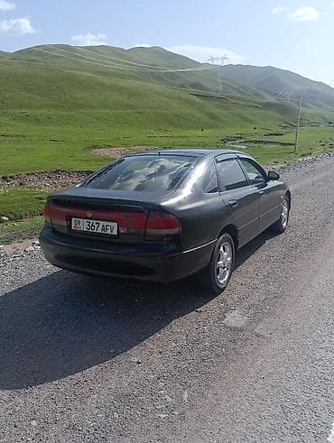 ml 163: Mazda 626: 1992 г., Седан — 8