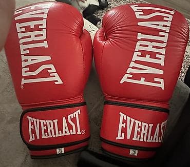Спорт и отдых: Продаю боксерские перчатки Everlast 16oz Красные. Пару тренировок — 1
