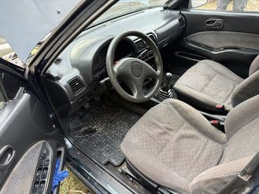 сиденья на портер 1: Suzuki Swift: 1994 г., 1.6 л, Механика, Бензин, Седан — 5