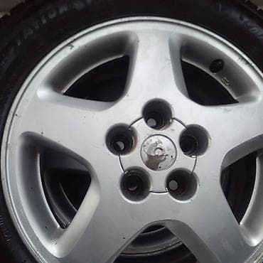 резина 215 50 16: Дөңгөлөктөр монтажда 205 / 60 / R 16, Кыш, Жеңил унаалар, Куйма, тешиктери - 4 — 1