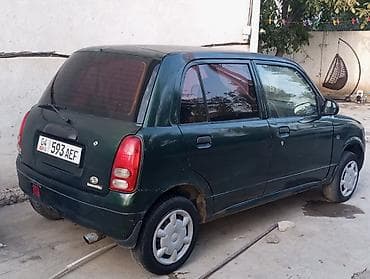 жили машина: Daihatsu Cuore: 2002 г., 1 л, Кол менен иштөөчү, Бензин, Хетчбек — 1