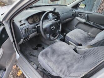 мицубиси айтрек: Mazda 323: 2002 г., 1.6 л, Механика, Бензин, Хэтчбэк — 7