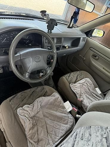 camry 2010: Mazda Demio: 1999 г., 1.3 л, Механика, Бензин, Универсал — 4